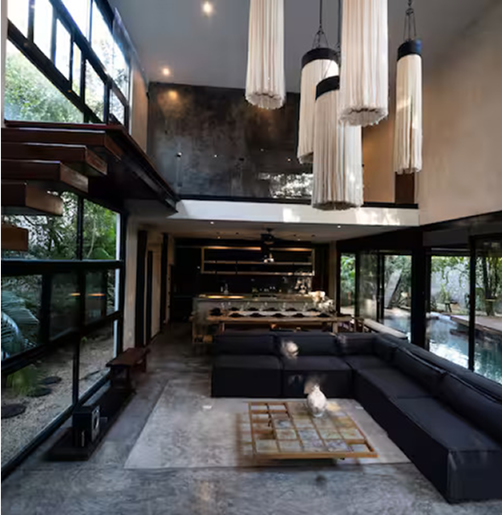 Modern interior living space with high ceilings