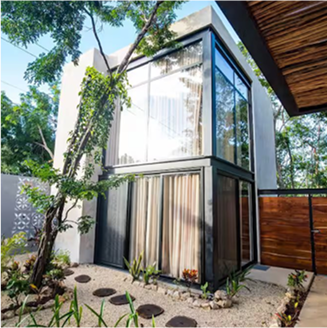 Glass house structure with plants